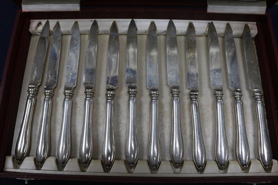 A cased set of twelve pairs of Swedish silver dessert eaters